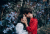 couple-touching-noses-in-a-garden